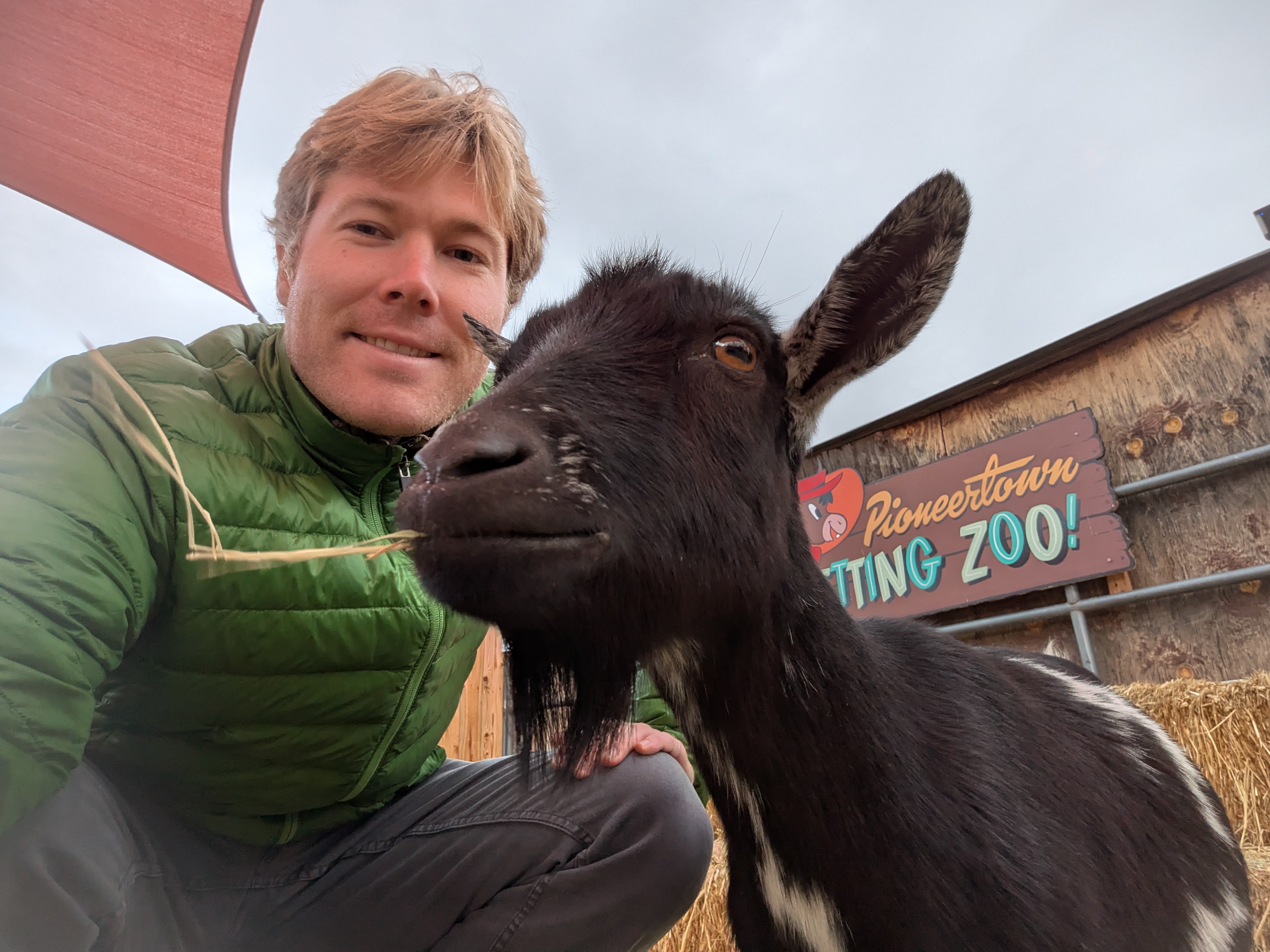 Photo of Jakub Preis with a goat